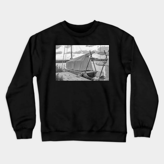 Traditional wooden sailing boat moored on the River Thurne, Norfolk Crewneck Sweatshirt by yackers1